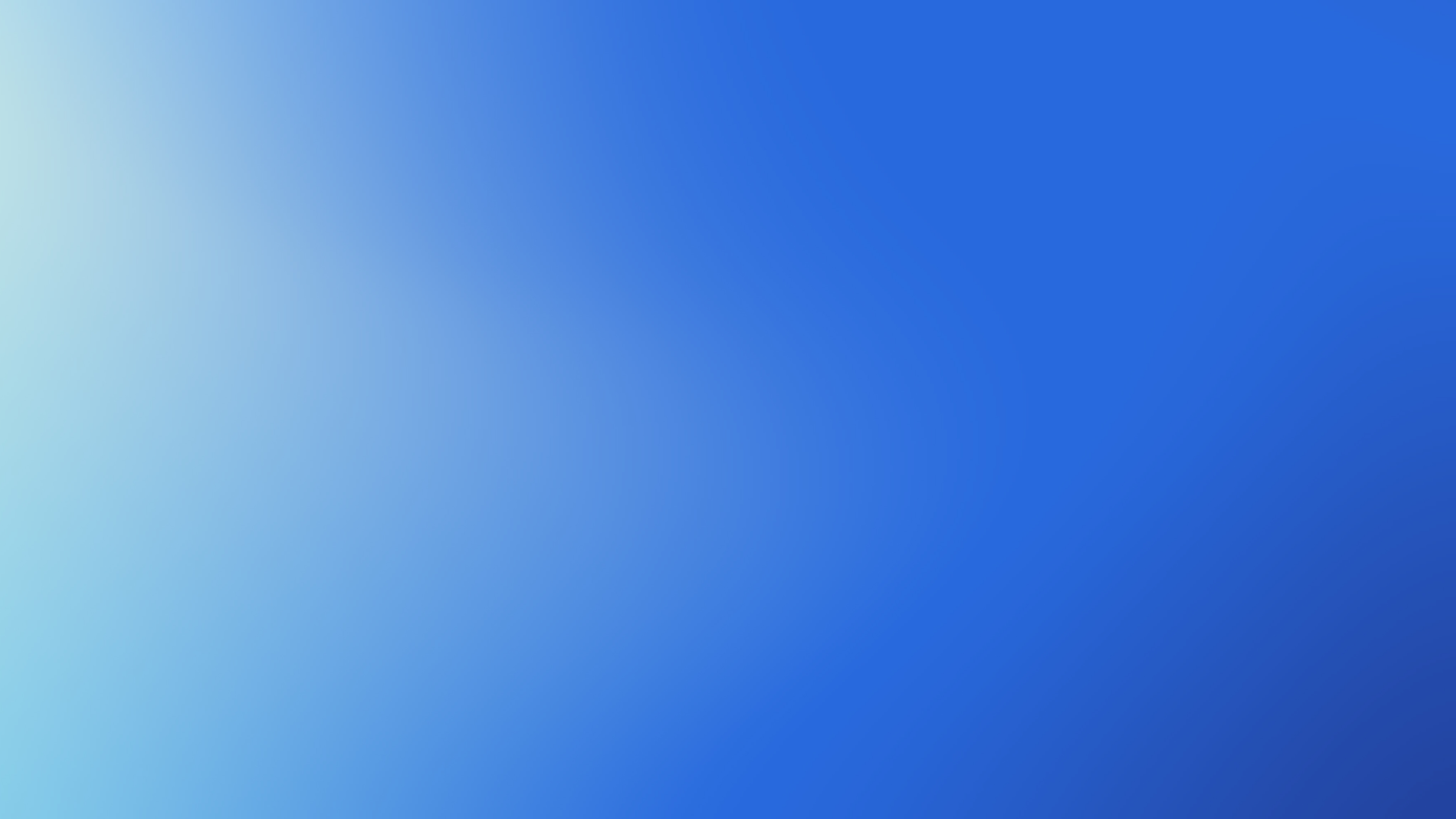 A smooth gradient transitioning from light cyan on the left to deep blue on the right.