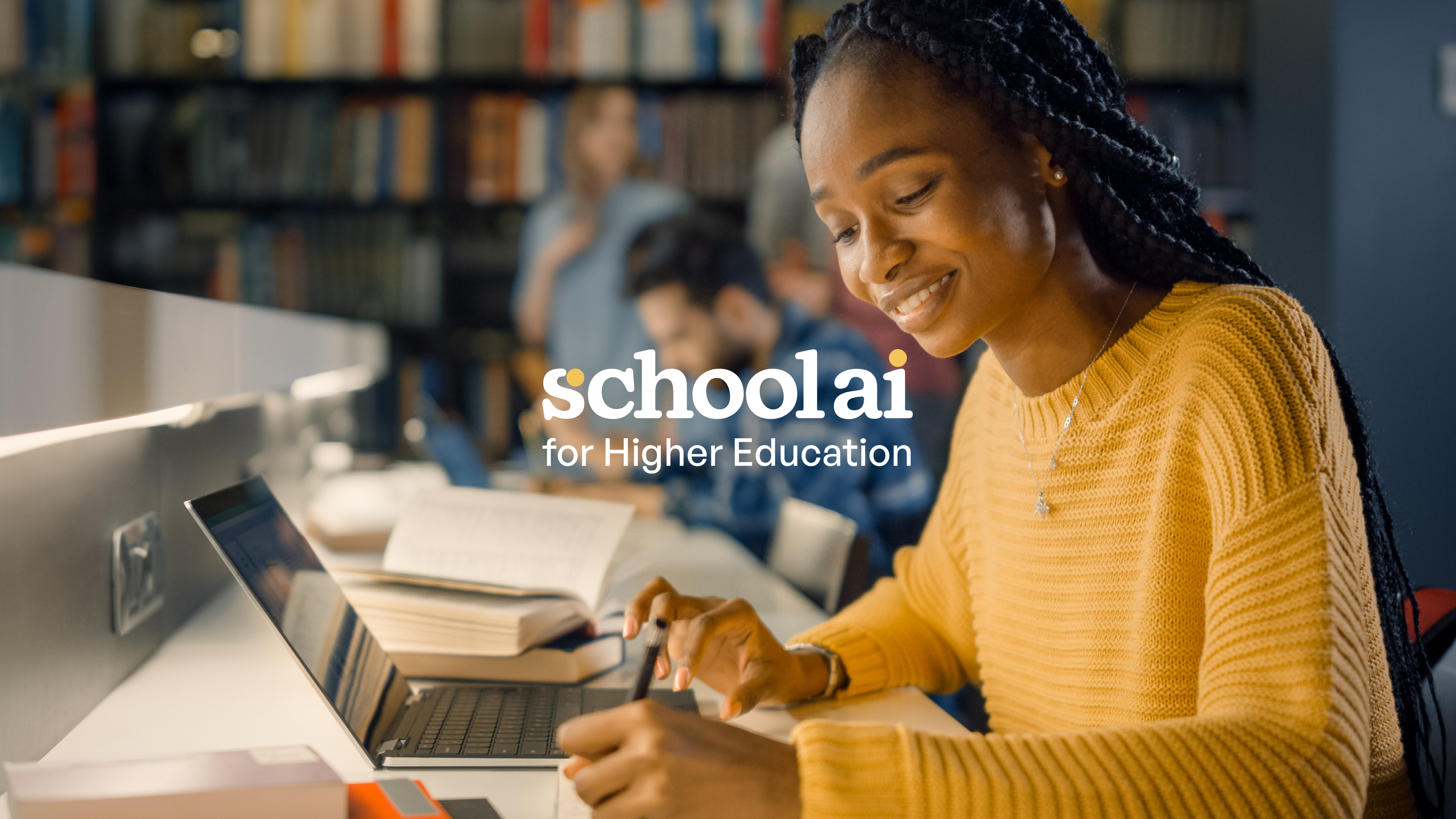 A smiling student in a yellow sweater studies at a laptop in a library with bookshelves in the background, promoting…