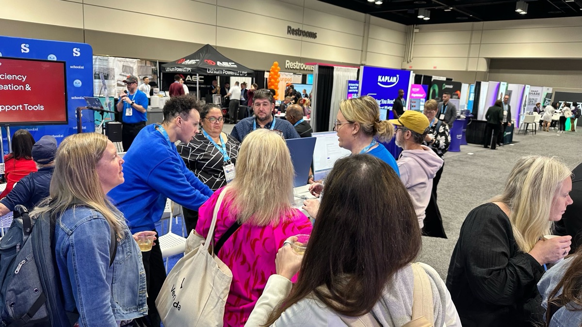 SchoolAI booth visitors